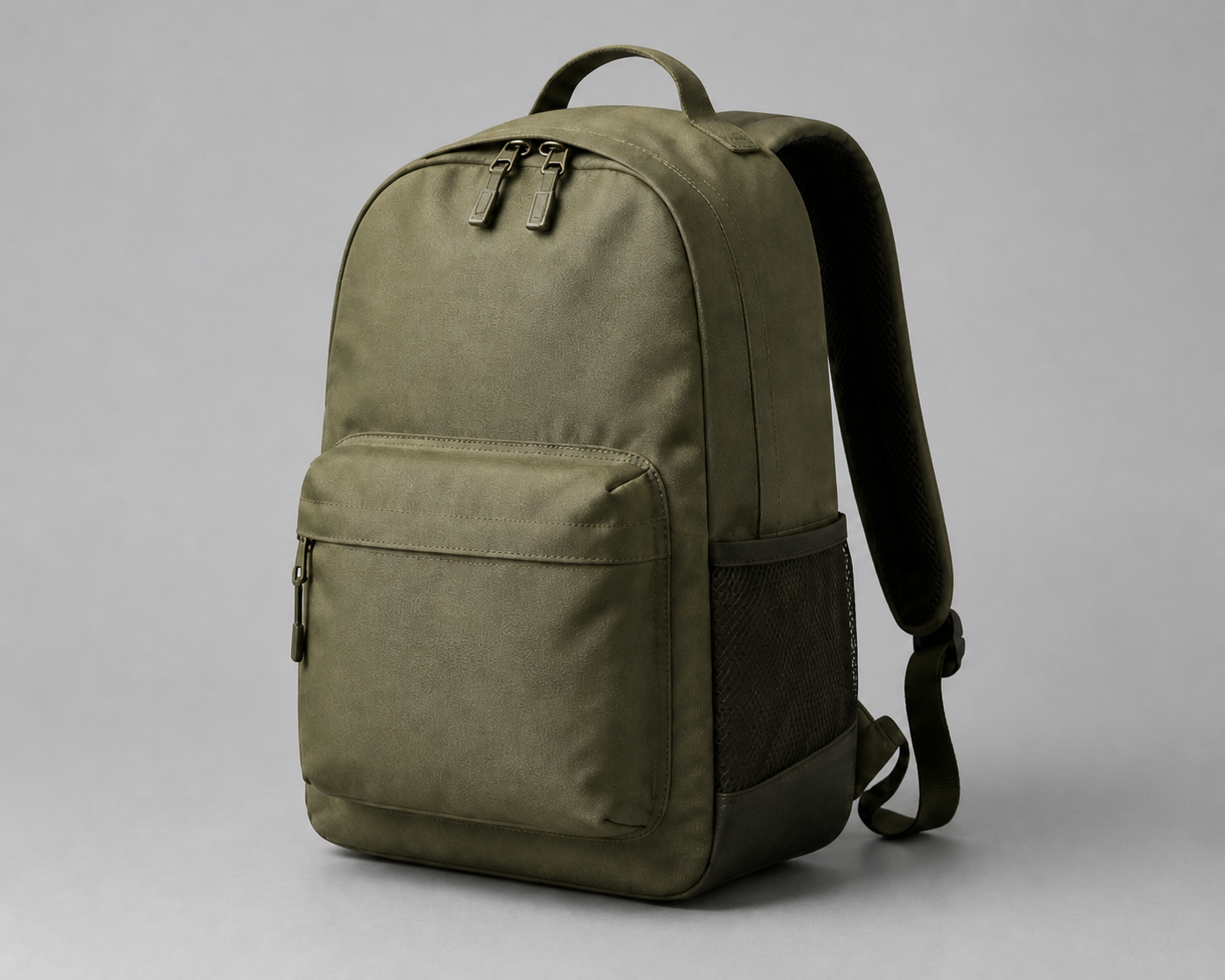 Olive backpack showing main zipper, front pocket, side mesh pocket and shoulder strap