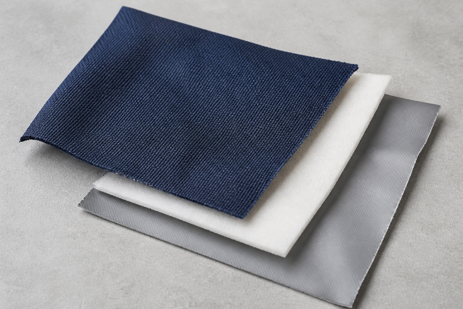 Separated outer fabric, foam and lining layers for an insulation study