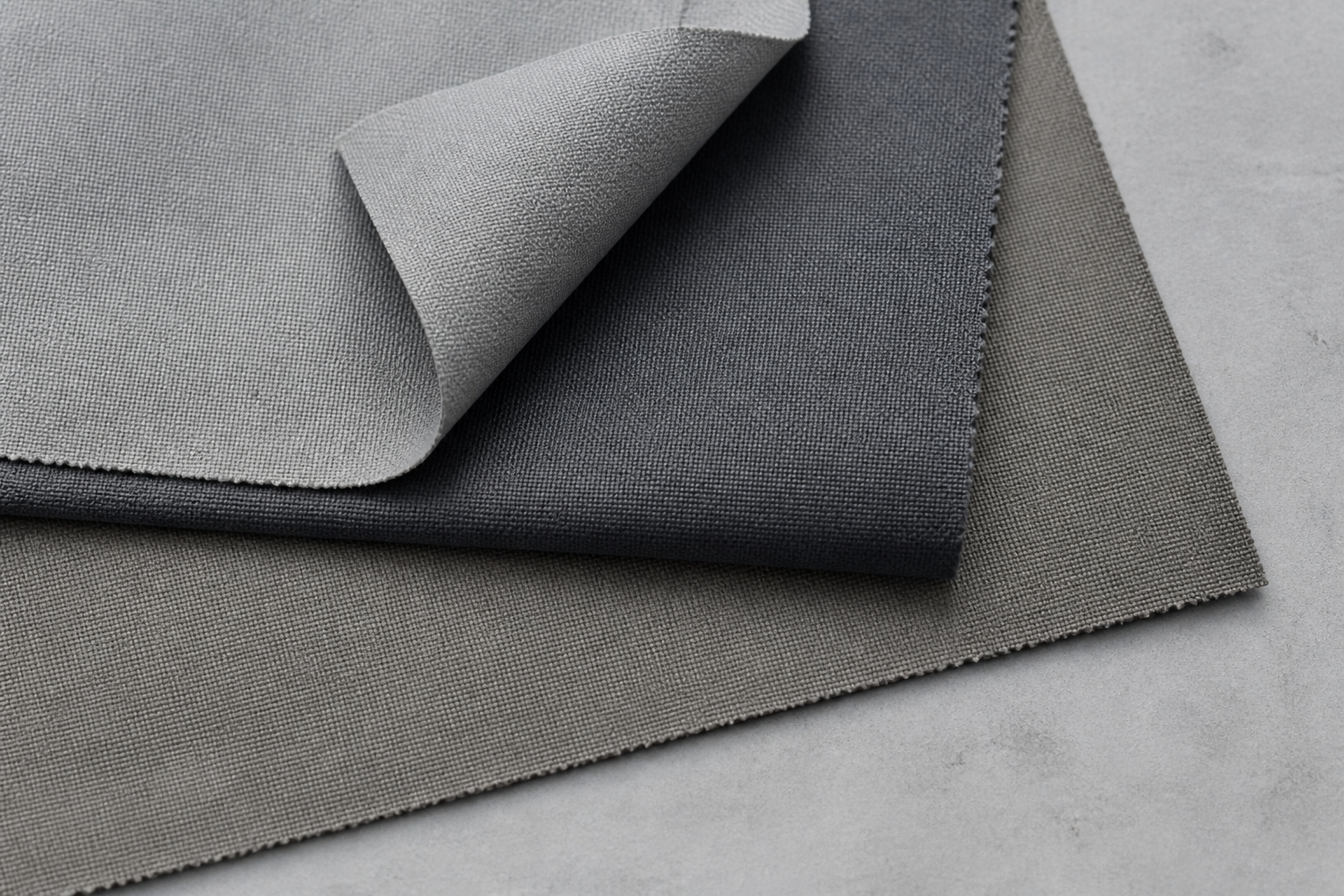 Grey lining fabric layers with a soft fold